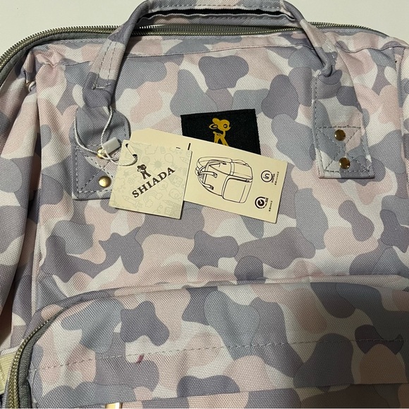 Shiada brand diaper bag backpack with a camouflage pattern in grey, pink, &white - Picture 6 of 15
